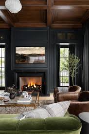 Black Paneled Fireplace Wall Design Ideas