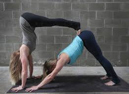 cindy agnew and angie currell from yoga hops offers up the pose of the day