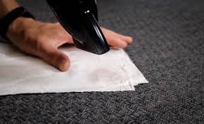 how to clean candle wax out of a carpet