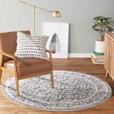 gray round indoor geometric area rug
