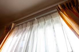 how to hang door panel curtains