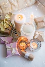 Stylish Still Life With Gift Boxes Candle Sticks Burning Candles Stock Photo Picture And Royalty Free Image Image 114769463