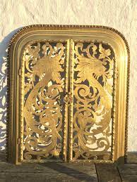 Antique Brass Fireplace Doors In Frame