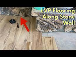 installing lvp flooring along a rough