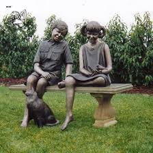 life size metal cast boy and girl