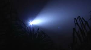police helicopter searchlight searches