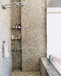 pebble tile bathrooms atticmag