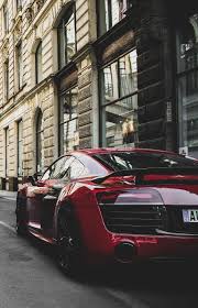 red and black audi r8 coupe parked near