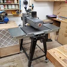 outfeed tables on the drum sander