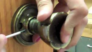 remove a doorknob with no visible s