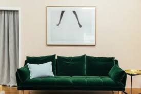 decorating a dark green couch