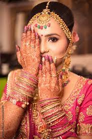 beautiful asian indian bride wearing