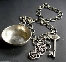 Image result for pictures of french silver tastevin with serpents