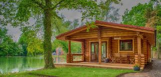 We Produce Milled Round Log Cabins And Handcrafted Square