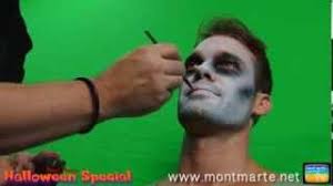 a zombie using face paint
