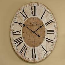 large oval wooden wall clock melody