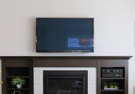 How Far Above A Fireplace To Mount Tv