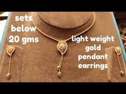 tanishq gold pendant chain earrings