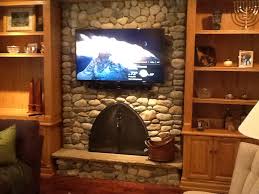 tv installation over a fireplace