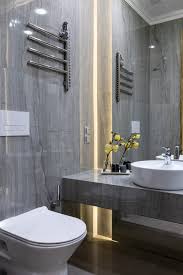 bathrooms designed using grey tiles