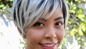 Jet black hair with highlights. Textured Long Layered Pixie With Asymmetrical Side Swept Bangs And Platinum Blonde Highlights On Black Hair The Latest Hairstyles For Men And Women 2020 Hairstyleology