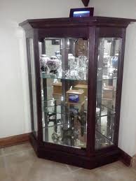 corner console curio cabinet