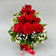 red rose in gl vase dp saini florist