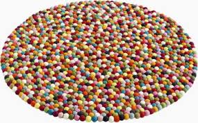 round multicoloured wool carpet