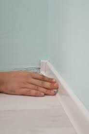 how to install rubber baseboard
