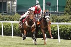 what-is-an-outrider-in-horse-racing