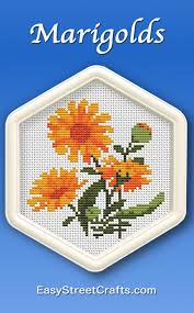 This Beautiful Cross Stitch Marigold Is Framed In A Hexagon