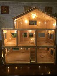 Popsicle sticks can be glued taped or even friction fit together to create all sorts of cool objects and designs but this popsicle stick craft house design is ultimate. Dollhouse Made Entirely From Popsicle Sticks Doll House Plans Barbie Doll House Popsicle Stick Houses