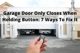 garage door only closes when holding