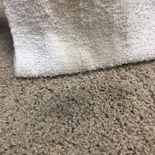 remove candle wax from carpet