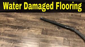 water damaged laminate flooring how to