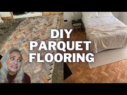 install reclaimed parquet flooring