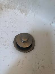 When the nut is tightened, reattach the rod to the strap using the clip that you removed earlier. Need Help Removing Bathtub Drain Stopper No Screw Top Doesn T Seem To Come Off Either Help Me Save Some Money Plumbing