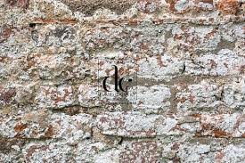 Old Very Worn Whitewashed Brick Wall