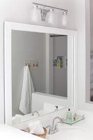 To attach the frame to the mirror, use mirror caulk or screws. How To Frame A Bathroom Mirror Easy Diy Project