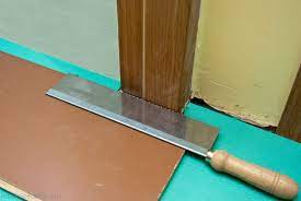 lay laminate flooring around doors