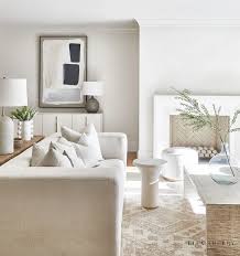 white sofa with white and beige rug