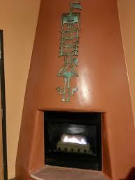 Gas Fireplace In Corner Of Room Has A