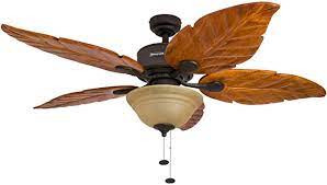 The fan mounting height from the ground is greater than 2.3m above the light steel armor on a flat roof, when the fan rotation ,please don't. Honeywell Sabal Palm 52 Inch Tropical Ceiling Fan With Sunset Bowl Light Five Hand Carved Wooden Leaf Blades Lindenwood Basswood Bronze Amazon Com
