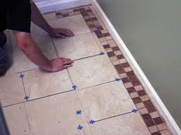 how to lay bathroom floor tiles for a