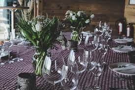 clear wine glasses beside white flower