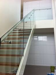 This is due not only to the cost of glass itself, but also to the engineering involved in manufacturing curved glass panels for railings. Glass Balustrade For Stairs With Side Mount Stainless Steel Handrail Balustrade Design Glass Staircase Railing Glass Balustrade