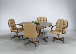 I'm considering adding casters to the chairs so that they are easier to move when you're sitting in them (they tend to get stuck on the carpet when you're seated and trying to move closer or further from the table). Rolling Dining Room Chair Sets Dining Chairs Design Ideas Dining Room Furniture Reviews