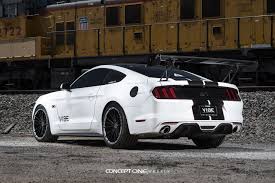 White is pretty much white, but there were two whites we think a black and white graphic of the red version was just lightened by the print setter prior to printing the newspaper so that the car features stood out. Black Stripes On Snow White Mustang S550 By Concept One Carid Com Gallery