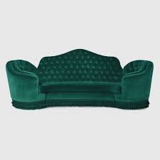 capitonné camelback sofa in green
