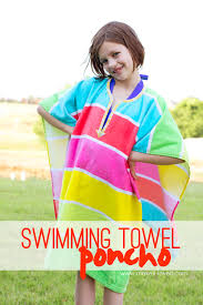 My kids started swim lessons last week, so i hurried and whipped up i actually got the idea from some character hooded towel ponchos i saw in bed, bath, & beyond and just hold the pattern in place and do your best. Diy Swimming Towel Poncho
